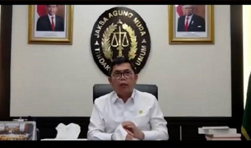 Jampidum Dr Fadil Zumhana menyampaikan pandangannya saat menjadi keynote speaker dalam Webinar Nasional dengan tema ”Restorative Justice sebagai Implementasi Dominus Litis Kejaksaan Republik Indonesia, Rabu (20/7).